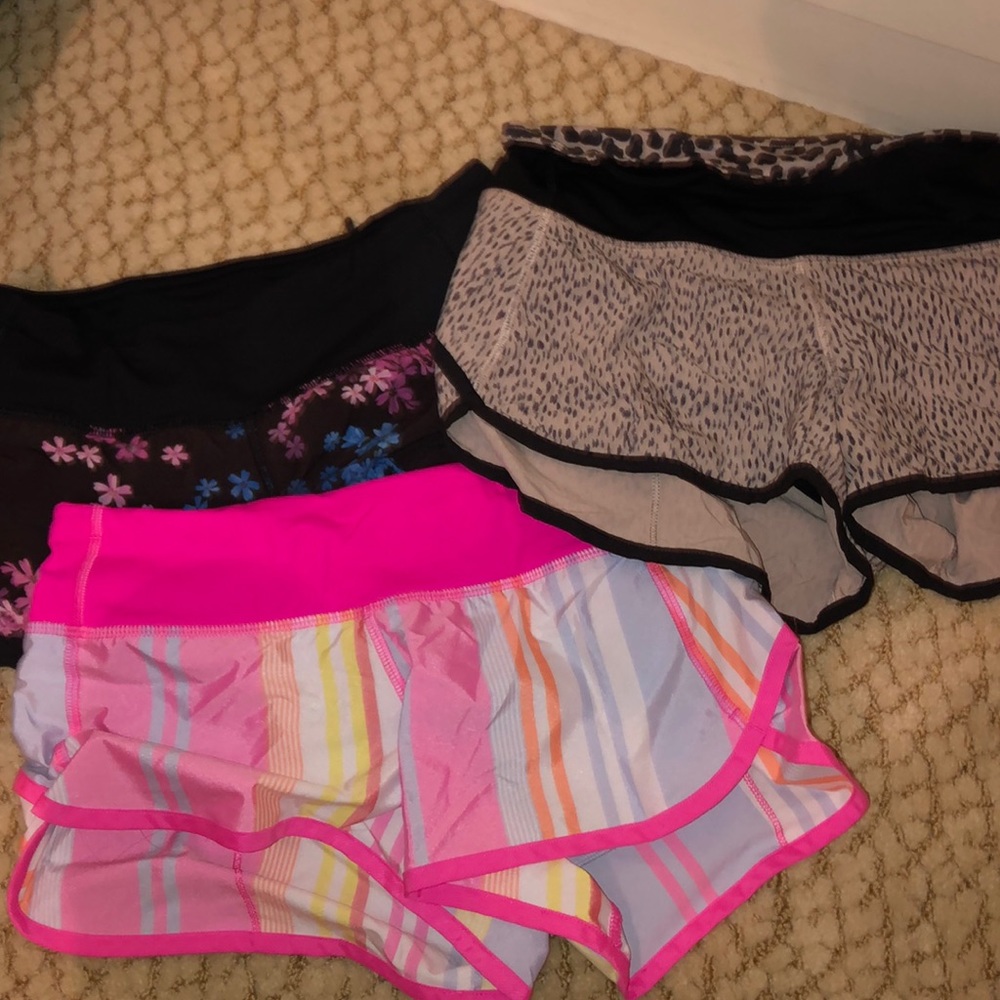 Three pairs of colorful lululemon  shorts